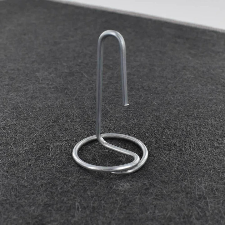 Silver metal place card holder.