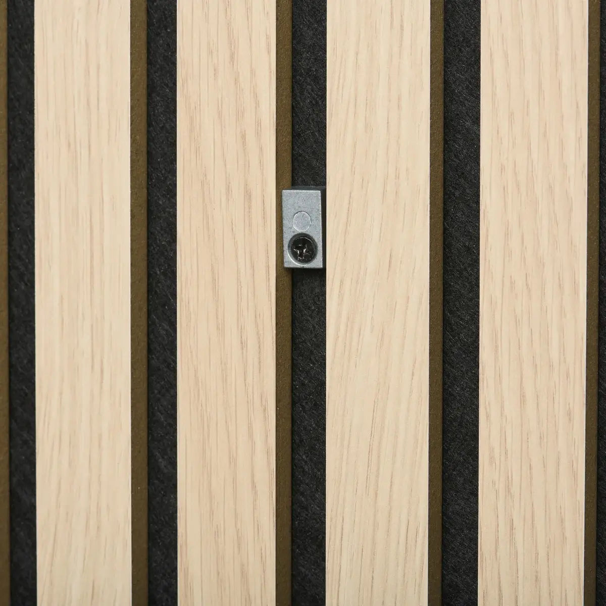 Close-up of wooden slat wall panel with gray backing and metal hardware.