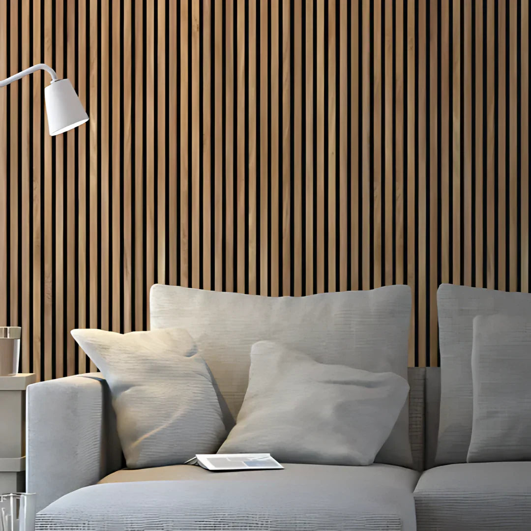 Contemporary living room with a light gray sectional sofa, wooden slat wall, and modern lamp.
