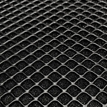 Black wire mesh over dark foam.
