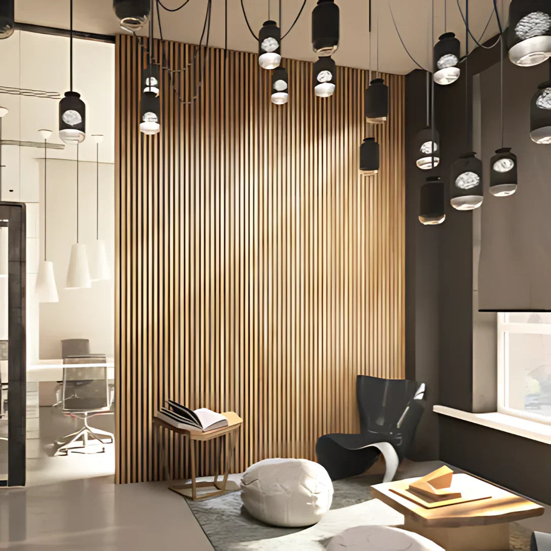 Interior room with slat wall, overhead lighting, chair, reading table, and window. 
