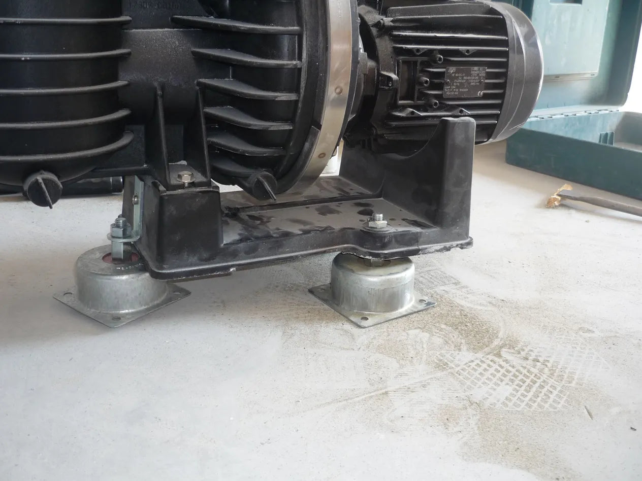 Industrial pump and motor on vibration isolators.