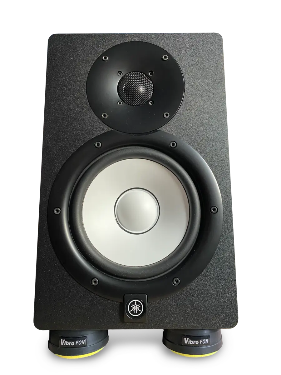 A black Yamaha studio monitor with a white woofer and a black tweeter, resting on Vibro FON isolation pads.
