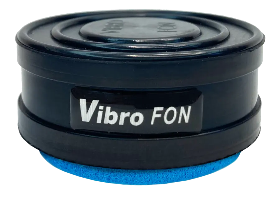 Black, cylindrical Vibro FON speaker with blue foam base.