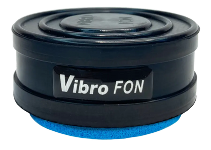 Black, cylindrical Vibro FON speaker with blue foam base.