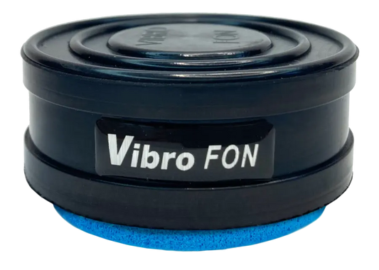 Black, cylindrical Vibro FON speaker with blue foam base.