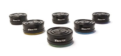 Six black, round Vibro FON discs with colored bases.
