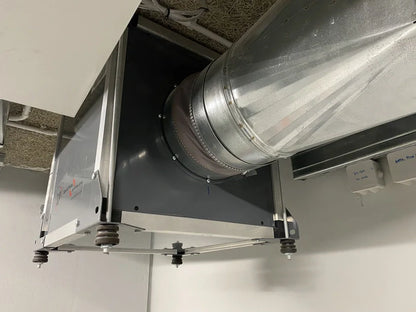 Industrial ventilation system with metal ductwork.