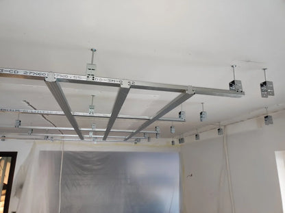 Metal framing structure for a suspended ceiling installation.