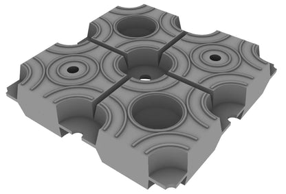 Gray interconnected blocks with circular designs and holes.